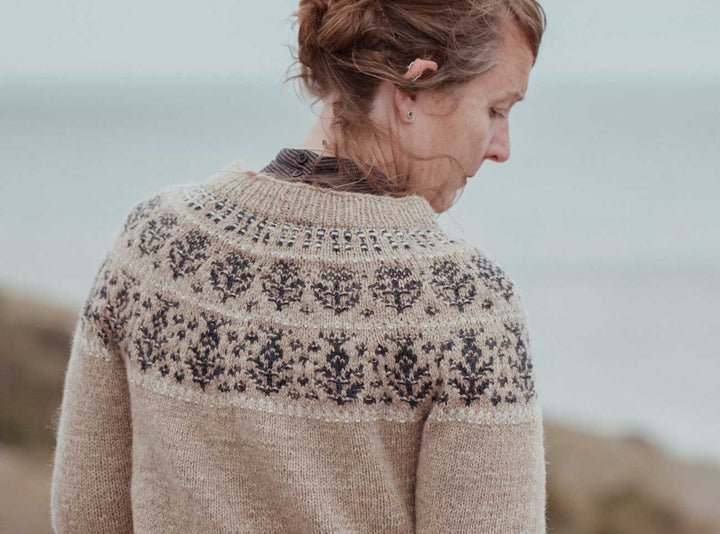 The Island and the Forest: A Knitted Correspondence